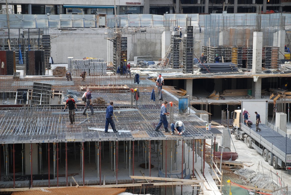 Zwele Trading construction site with workers on a concrete slab